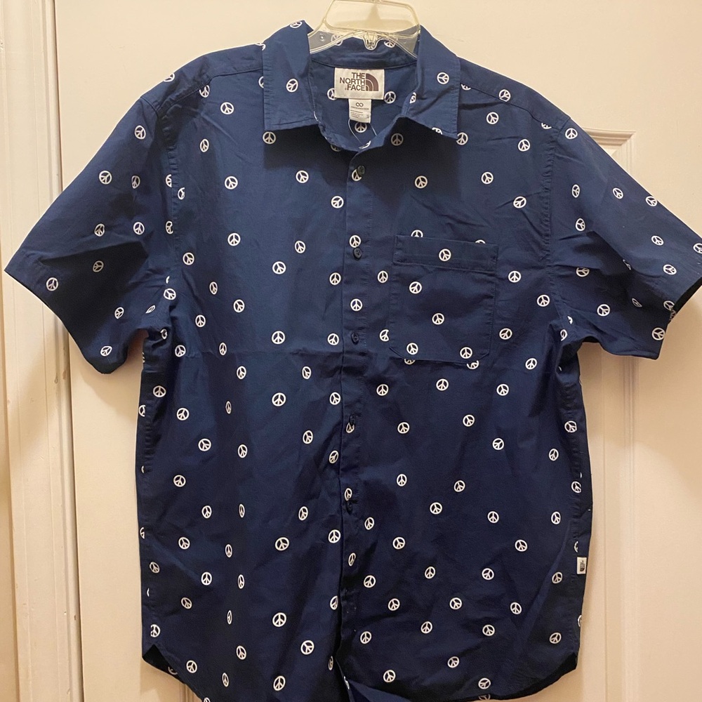The North Face Blue Shirt with White Peace Symbols